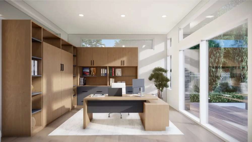 Inside Sawmill Structures The Algonquin Garden Suites, a bright office space includes a modern wooden desk, sleek cabinetry, and large windows