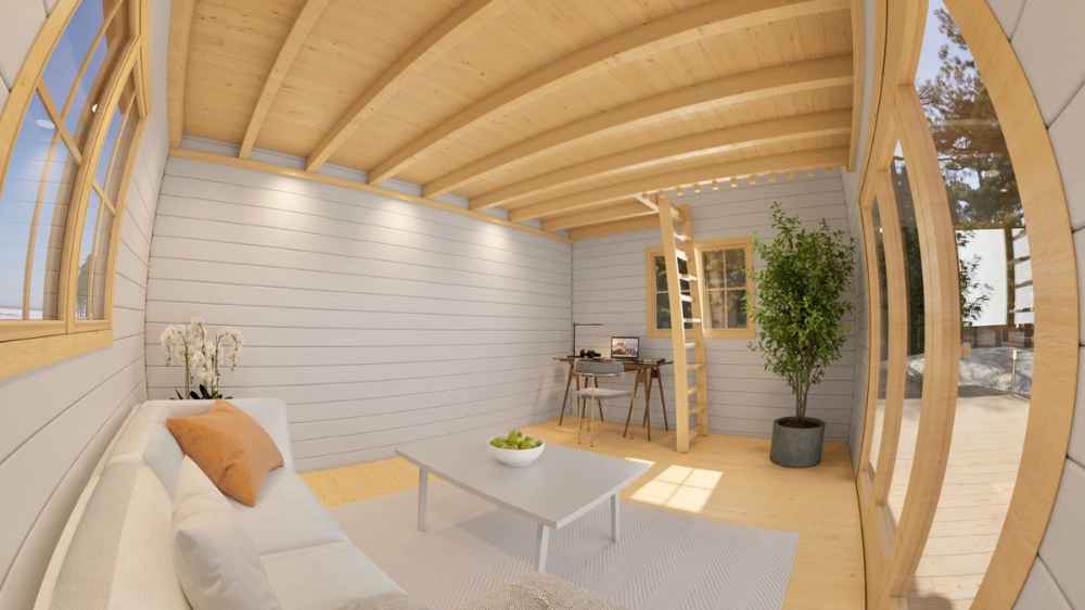 Inside Sawmill Structures The Versa 160 Atrium Loft 70MM Garden Room, natural light fills a minimalist lounge with a white couch, ladder, and desk