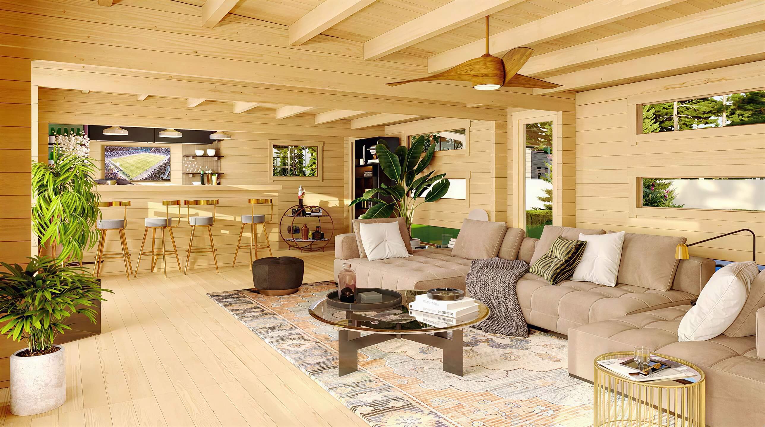 Inside the GardenHouse24 USA Dundee 90A Garden Room, there’s a cozy lounge with a large sectional sofa, bar counter, ceiling fan, and warm wood interior