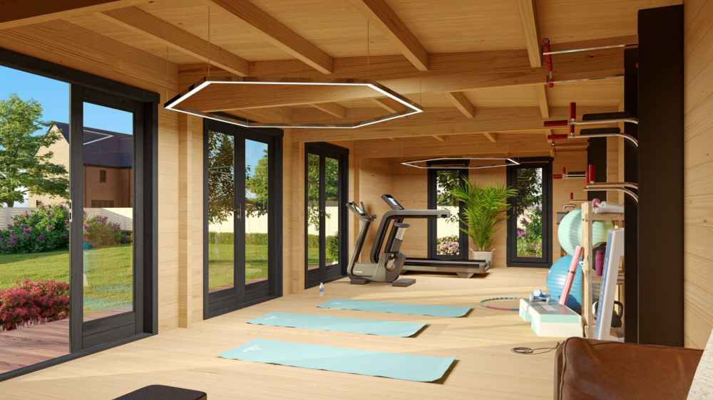 Inside the GardenHouse24 USA Game Room 70 Garden Room, a spacious workout area is equipped with treadmills, yoga mats, gym gear, and large windows offering a scenic garden view