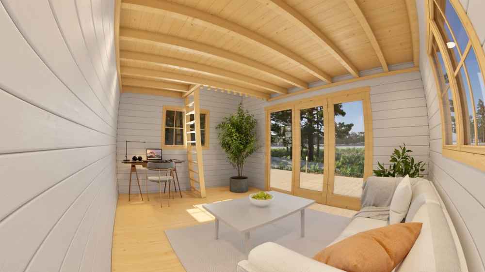 Interior of Sawmill Structures The Versa 160 Atrium Loft 70MM Garden Room shows a clean, wood-paneled space with a sofa, plants, and work desk