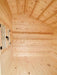 Interior of the Sawmill Structures Bluewater Den 67 Garden Room, with natural pine wood walls, a pitched roof, and visible rafters