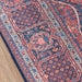 Intricate border and floral patterns of Momeni Afshar Indoor Rug - AFS10 Navy featuring deep navy and red tones with fine detailing