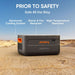 Jackery Battery Pack 2000 Plus sits on a desert landscape with labels highlighting its advanced cooling system, shock and fire resistance, and high-temperature resistance