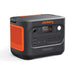 Jackery Explorer 1500 v2 Portable Power Station is shown at an angle with its front outlets, display screen, and orange side vent visible