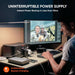 Jackery Explorer 500 v2 Portable Power Station powers a desktop setup during a blackout, highlighting its fast UPS backup capability