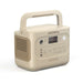 Jackery Explorer Dune White 1000 V2 Portable Power Station shown at an angled view with its sturdy handle, side vents, and portable design