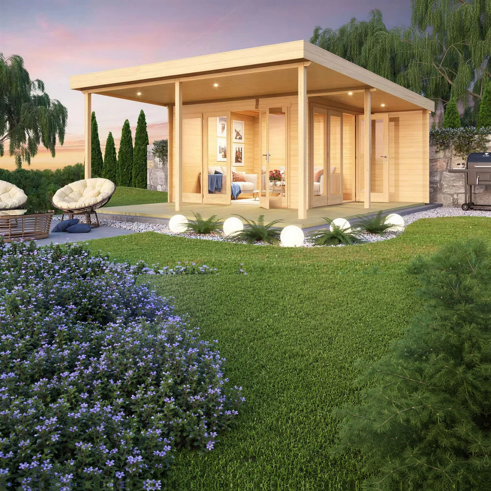 A twilight rendering of the GardenHouse24 USA Keno 70 Garden Room depicts a cozy, lit-up interior surrounded by a beautifully landscaped yard