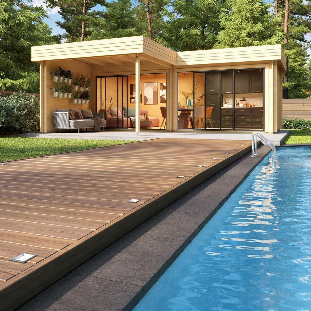 GardenHouse24 USA Lasse 44B ALU Garden Room is beautifully staged by a pool, featuring cozy seating, dining space, and a mini kitchen inside