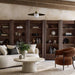 Living room featuring multiple Crate & Barrel Siena 34" Walnut Wood 4-Shelf Storage Bookcase with Drawer units styled with books and decor