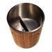 Looking down into Golden Designs Dynamic Cold Therapy Barrel 304 Stainless Steel Cold Plunge reveals a brushed stainless steel interior with a built-in seat