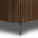 Lower frame of Crate & Barrel Baylor Brown Ribbed Solid Oak Wood Bed displays ribbed solid oak panels supported by a slim dark metal leg