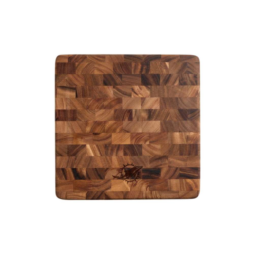Miami Dolphins Crate & Barrel NFL Square End Grain Cutting Board features a warm wood-block surface with the Dolphins logo engraved near the bottom