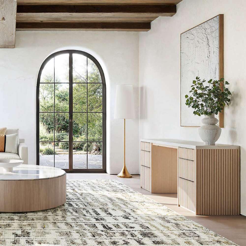 Modern living room styled with Crate & Barrel Batten 62" White Oak Wood Console Desk with White Marble Top as a console table