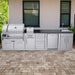 Modern outdoor kitchen with grill, sink, fridge, and cabinets from the Sunstone Cypress 11.6FT Outdoor Cabinet large Island Package