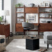 Modern workspace with shelving and a desk, featuring Crate & Barrel Tate Walnut Lateral File Cabinet as part of a coordinated walnut storage collection