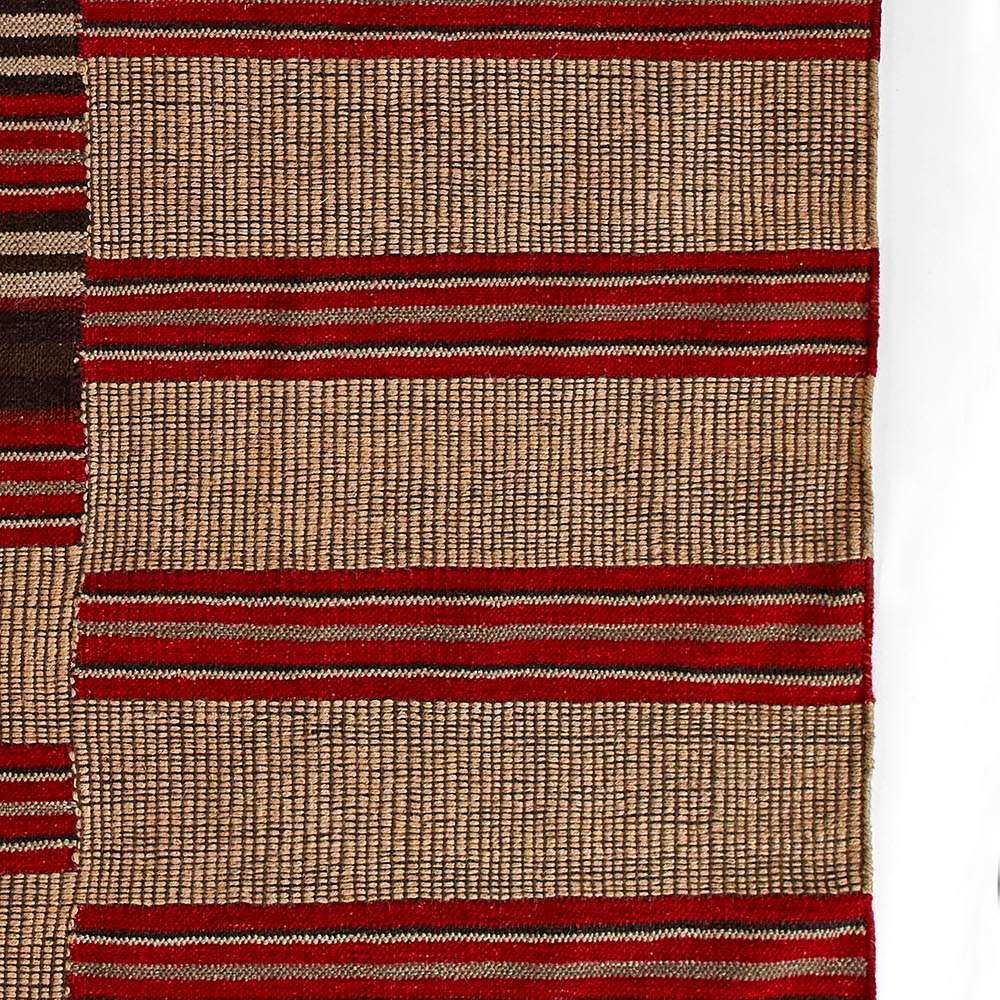 Momeni Adobe Indoor Rug - ADO-1 Red features bold red and tan stripes woven in a rustic, handcrafted design