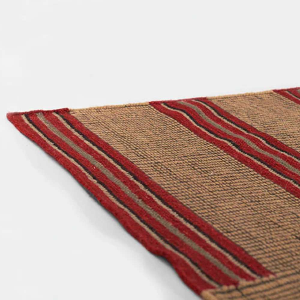 Momeni Adobe Indoor Rug - ADO-1 Red showcases its clean, flat edge finish and striped design in warm desert-inspired hues