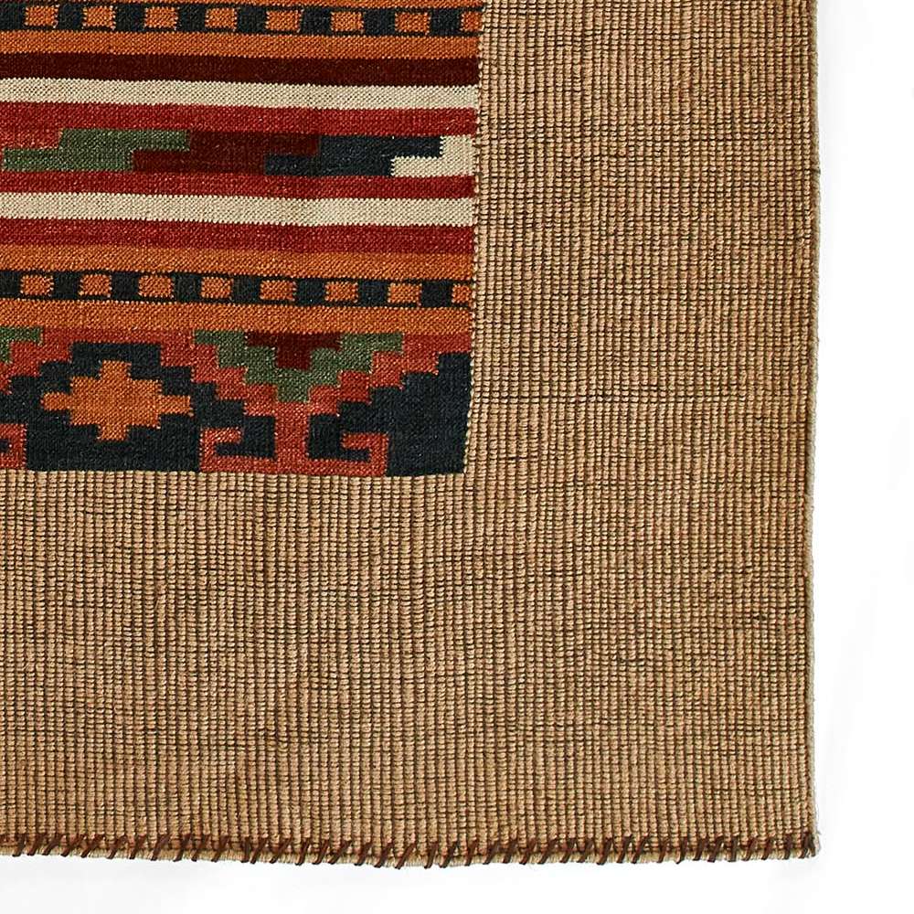Momeni Adobe Indoor Rug - ADO-2 Multi features a Southwestern-inspired design with bold stripes and geometric motifs framed by a natural-toned border