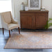 Momeni Afshar Indoor Rug - AFS11 Copper lies beautifully in a cozy living room setup