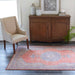 Momeni Afshar Indoor Rug - AFS12 Red adds a pop of color and elegance to a modern living room