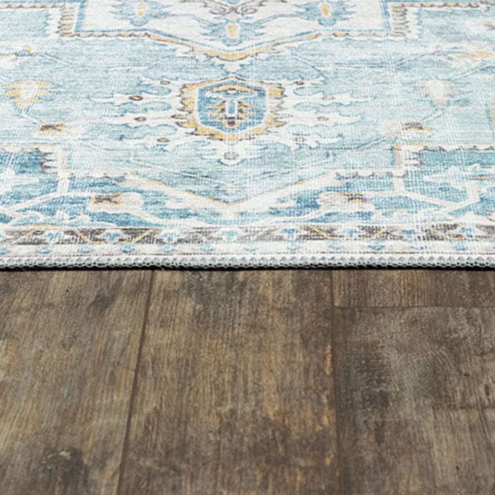 Momeni Afshar Indoor Rug - AFS32 Light Blue laid flat on a hardwood floor