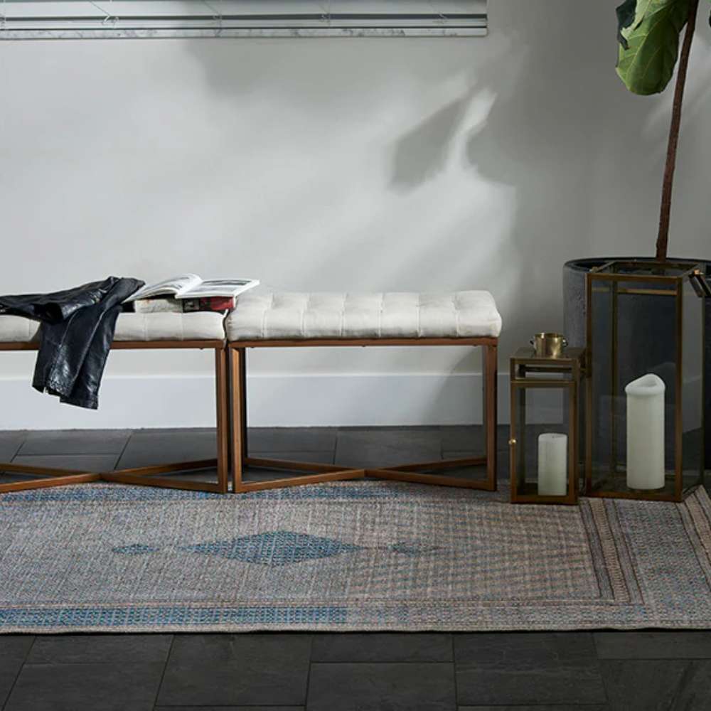 Momeni Afshar Indoor Rug - AFS34 Blue styled in a modern entryway pairs its subtle patterns with contemporary furniture