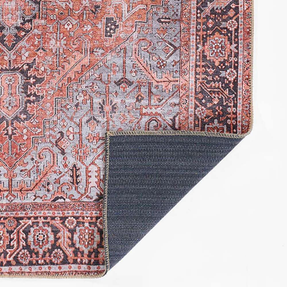 Momeni Afshar Indoor Rug - AFS36 Copper shows its corner fold revealing a durable backing
