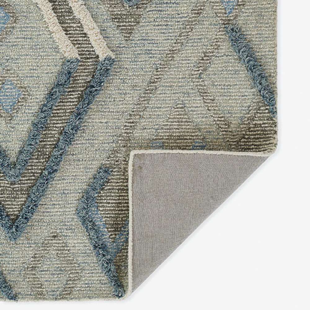 Momeni Allegro Indoor Rug - ALL-1 Blue displays a corner fold highlighting its durable woven backing and detailed pattern