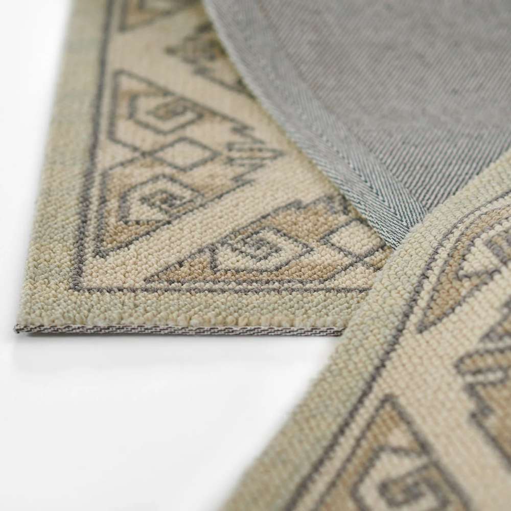Momeni Anatolia Indoor Rug - ANA-11 Sage shows its layered edges and finely stitched border