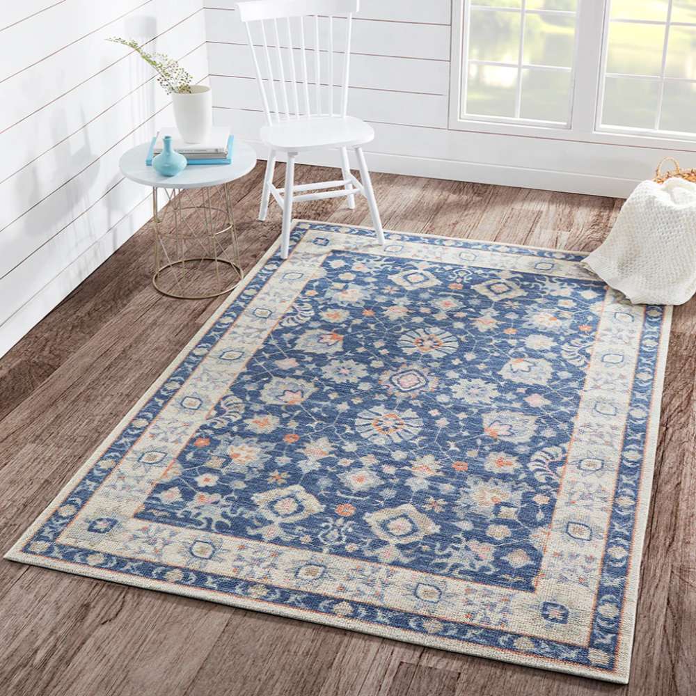 Momeni Anatolia Indoor Rug - ANA-8 Navy adds a classic touch to a bright living room with its bold navy floral design