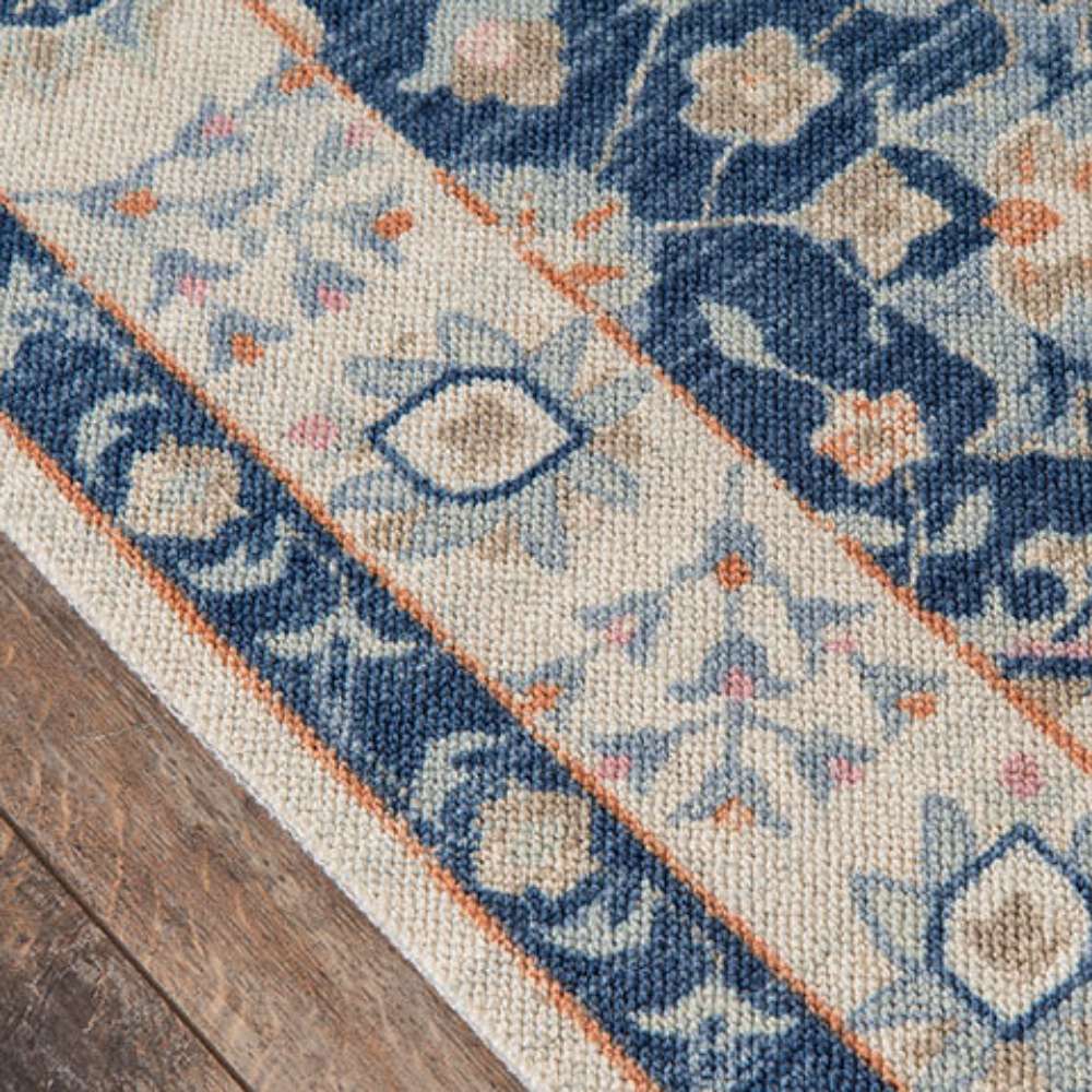 Momeni Anatolia Indoor Rug - ANA-8 Navy features a detailed floral border design in soft beige and blue tones
