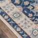 Momeni Anatolia Indoor Rug - ANA-8 Navy features a detailed floral border design in soft beige and blue tones