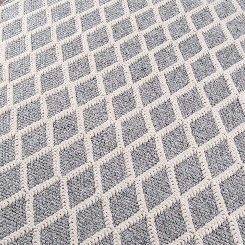 Momeni Andes Indoor Rug - AND-7 Grey features a textured diamond pattern in grey and ivory
