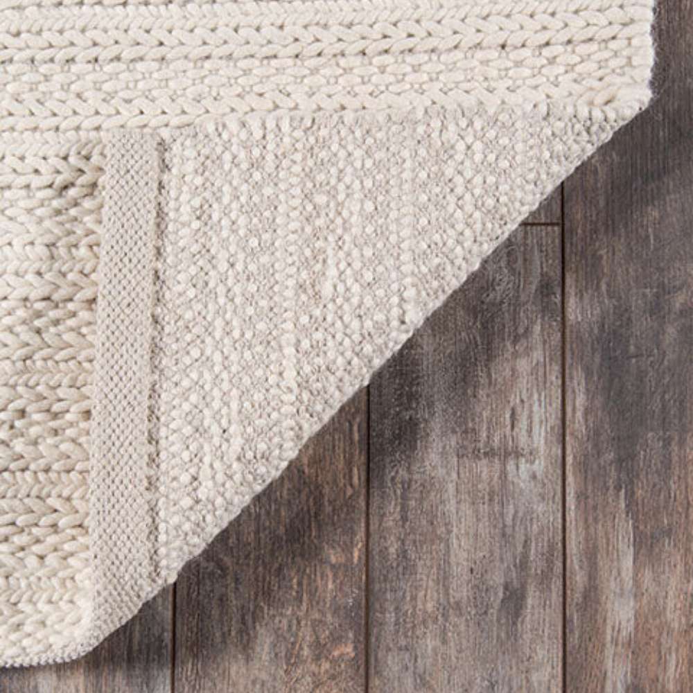 Momeni Andes Indoor Rug - AND-9 Ivory shows its textured backing