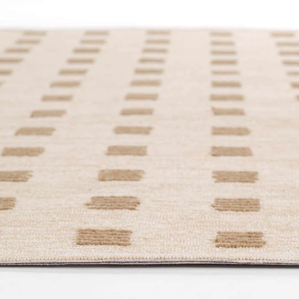 Momeni Archer Indoor Rug - ARC-1 Beige displays evenly aligned rows of textured squares on a beige background