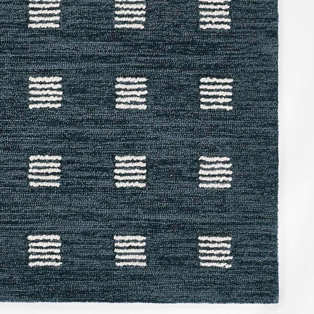 Momeni Archer Indoor Rug - ARC-1 Blue features a modern navy base with white square line accents