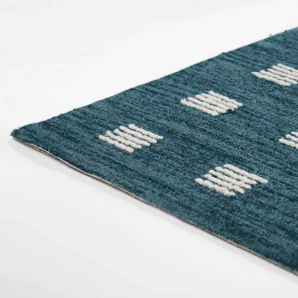 Momeni Archer Indoor Rug - ARC-1 Blue lies flat with a sleek, low pile