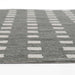 Momeni Archer Indoor Rug - ARC-1 Charcoal features evenly spaced rows of white patterned squares on a dark grey background
