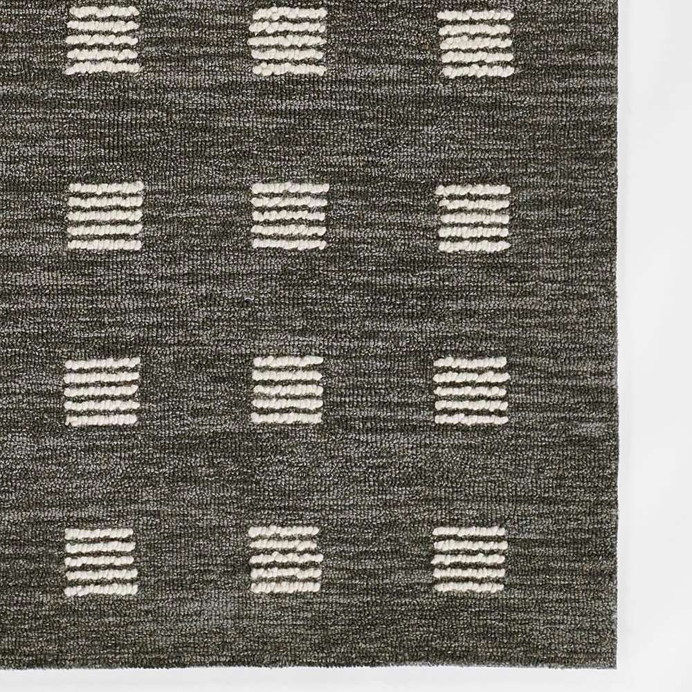 Momeni Archer Indoor Rug - ARC-1 Charcoal shows a modern dark charcoal base with neatly arranged textured white square patterns