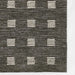 Momeni Archer Indoor Rug - ARC-1 Charcoal shows a modern dark charcoal base with neatly arranged textured white square patterns