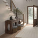 Momeni Archer Indoor Rug - ARC-3 Beige adds warmth and texture to a rustic entryway with wooden floors and natural light