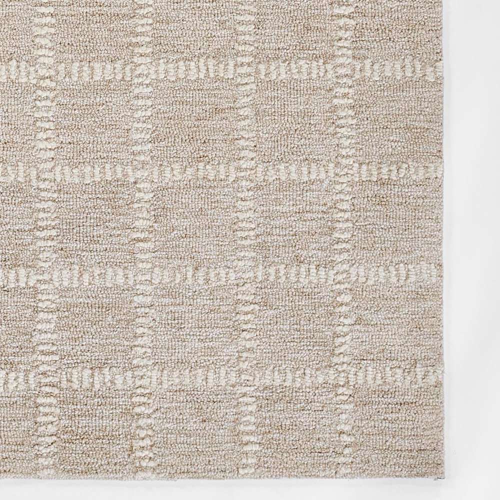 Momeni Archer Indoor Rug - ARC-3 Beige features a soft beige checkered pattern with subtle textured lines