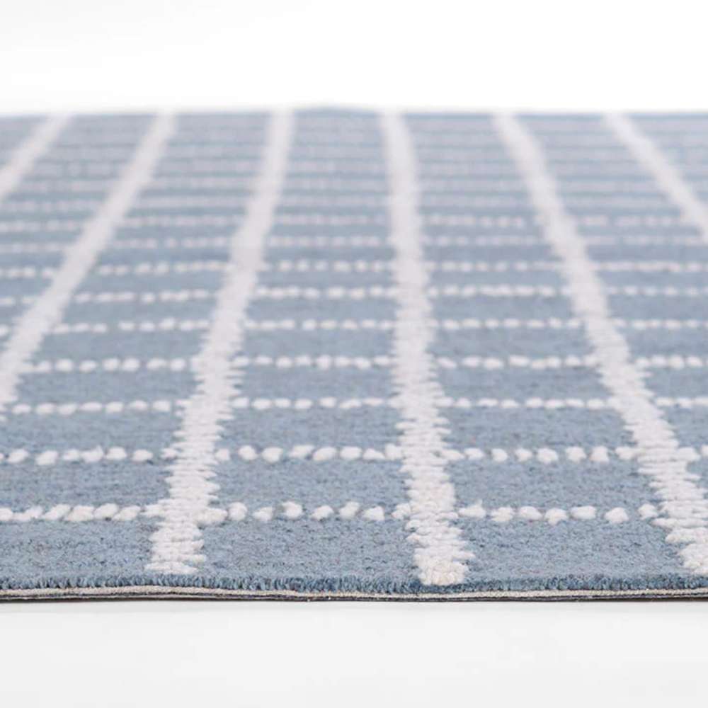Momeni Archer Indoor Rug - ARC-3 Blue displays its even texture and low pile from a side view