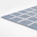 Momeni Archer Indoor Rug - ARC-3 Blue lies flat, showcasing its thin yet plush profile and smooth edges