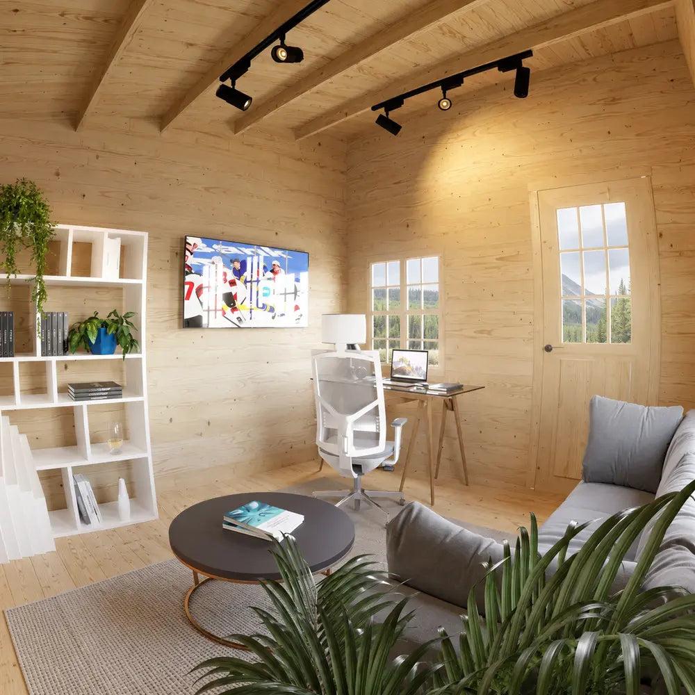 Cozy Multi Cube Versa 100 workspace with pine walls, a white desk and chair, laptop, bookshelves, television, sofa, and natural light.