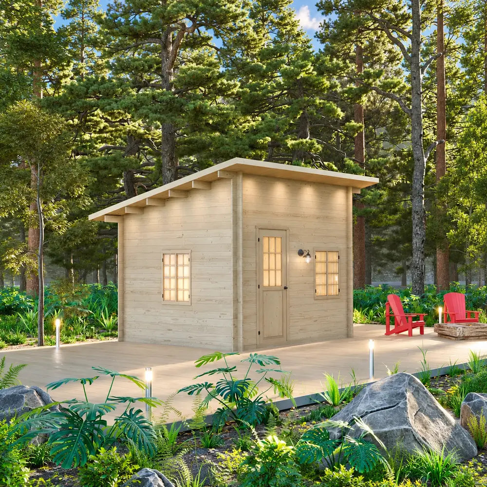 Single-room Multi Cube Versa 100 cabin with a slanted roof on a wooden deck amid tall forest trees and landscaped greenery.