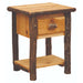 Natural Fireside Lodge Log One Drawer Nightstand with Shelf is shown in a light wood finish with visible grain, log legs, one drawer, and a shelf