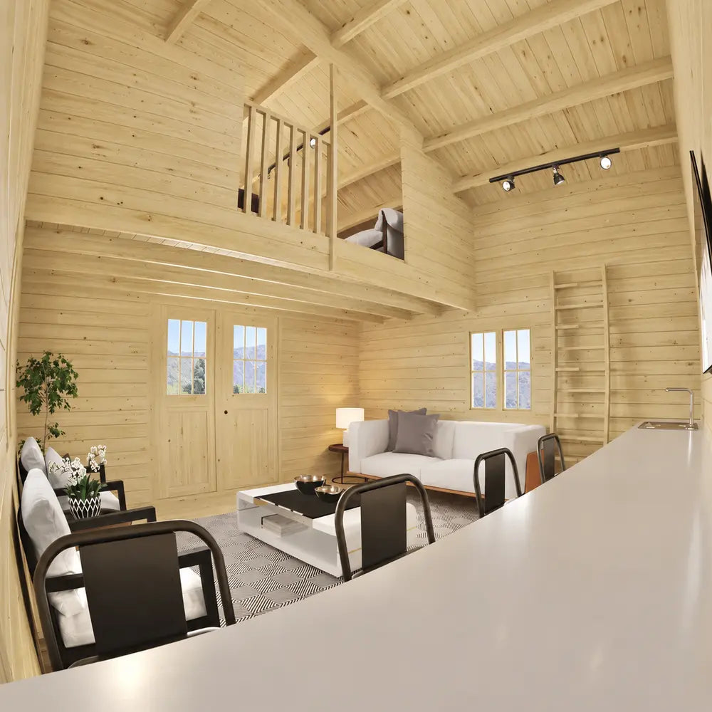 Double-height Northwood Grand interior with modern seating, a kitchen counter, wooden ladder and an open loft area above.