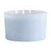 Ocean light blue three-wick Crate & Barrel Monochrome Scented Candle featuring a subtle Carolina Panthers logo on the wide glass vessel